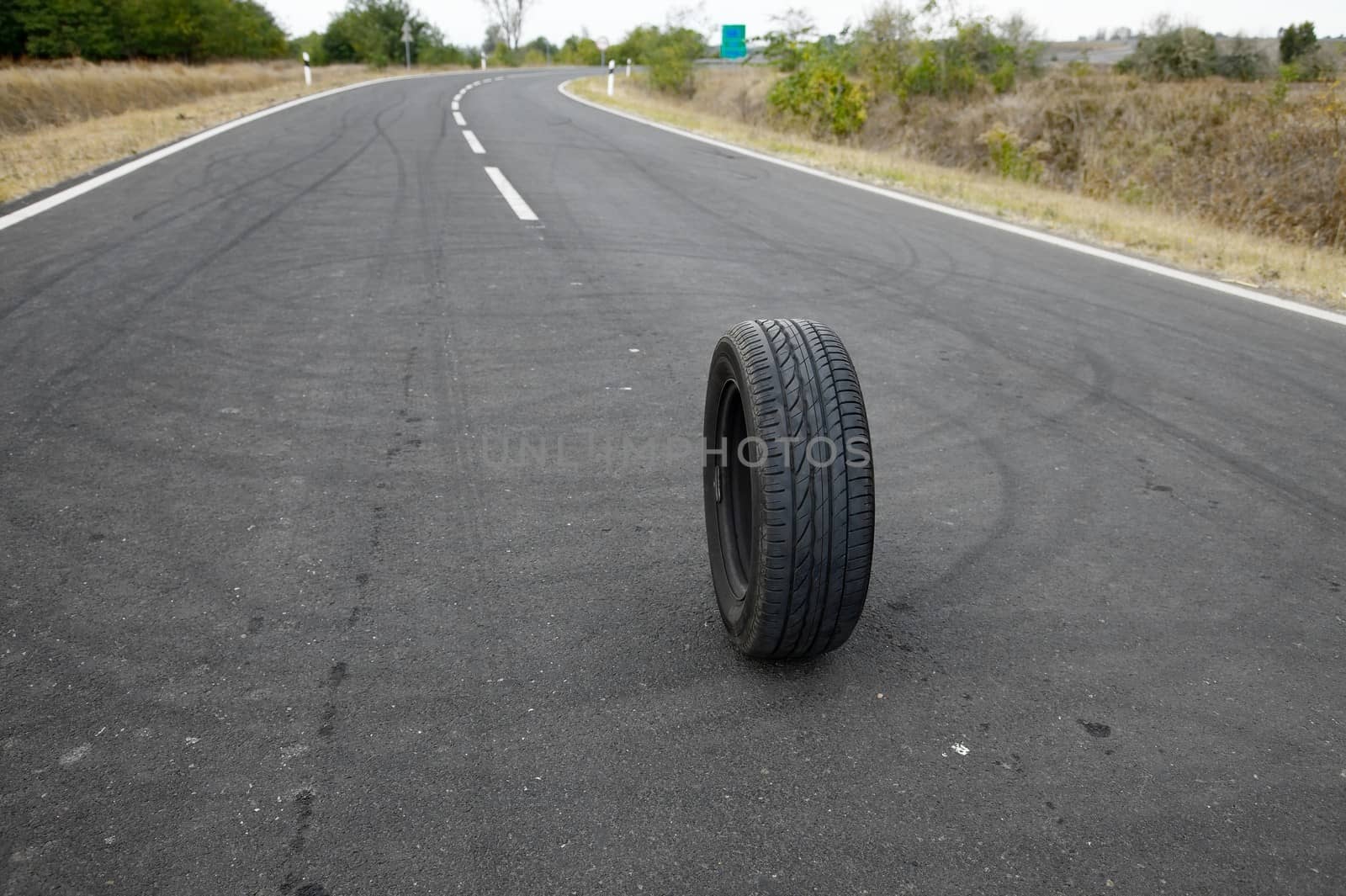 Wheel of a car on a road