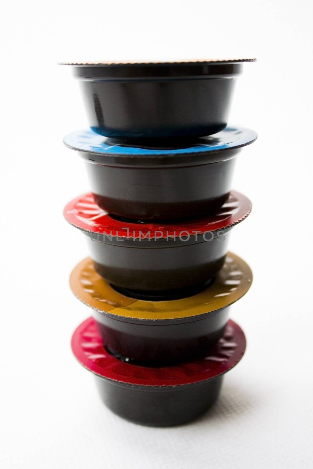 Coffee Capsules collection on a white background.