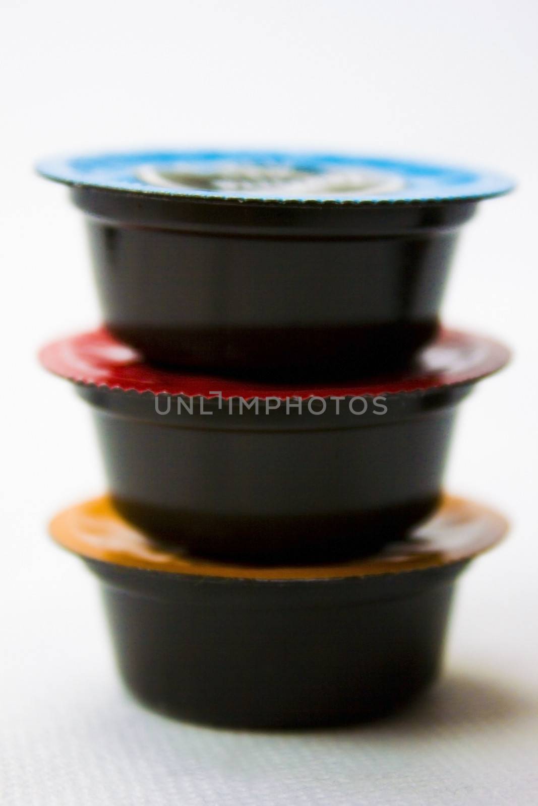 Coffee Capsules collection on a white background.