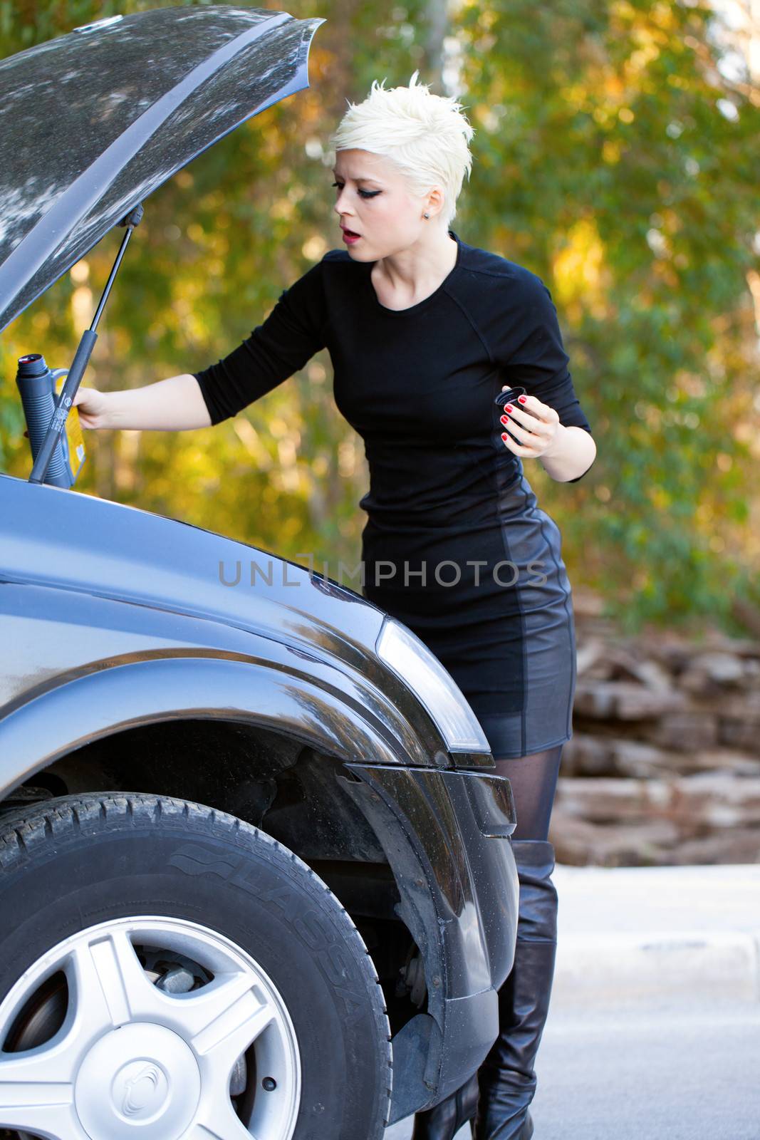 Blond Woman and the Car by okanakdeniz