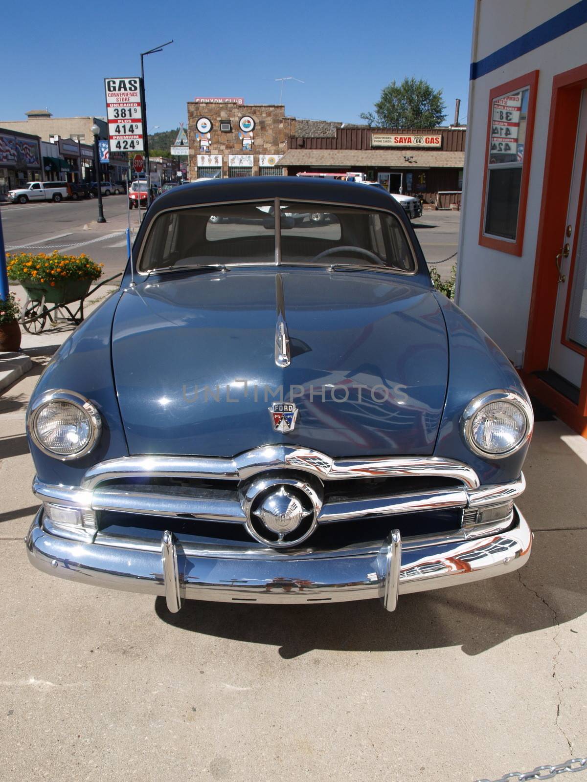 PAGE - SEPTEMBER 22: Classic blue Ford car parking at "Pete's Ga by anderm