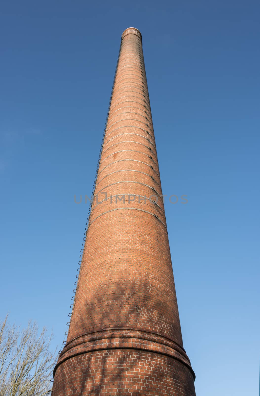 catherdral; steam; woudagemaal; lemmer; netherlands; holland; visitors; centre; building; architecture; water; sky; trees; nature; path; doors; green; nature; chimney; stones