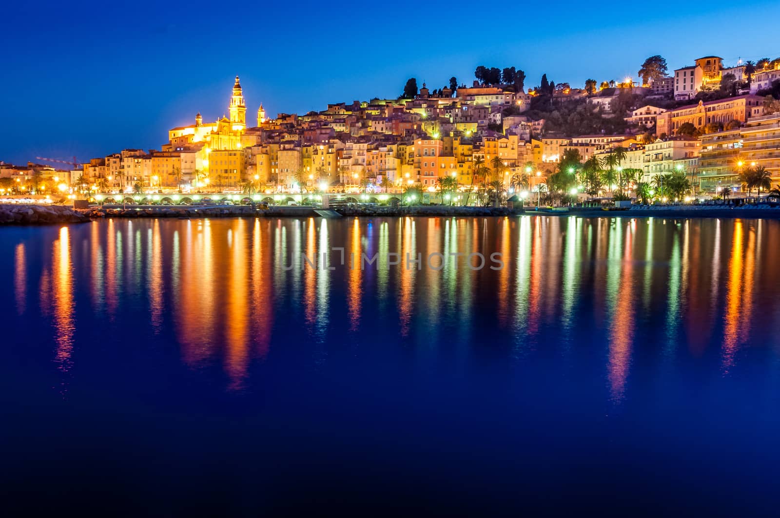 Night skyline of colorful village Menton in Provence by martinm303