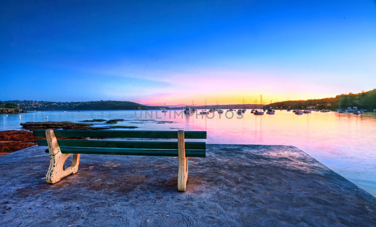 Come take a seat, watch the sunrise and admire the tranquil views of Balmoral, Australia.  Buyers note  long 22sec exp, some motion in boats etc