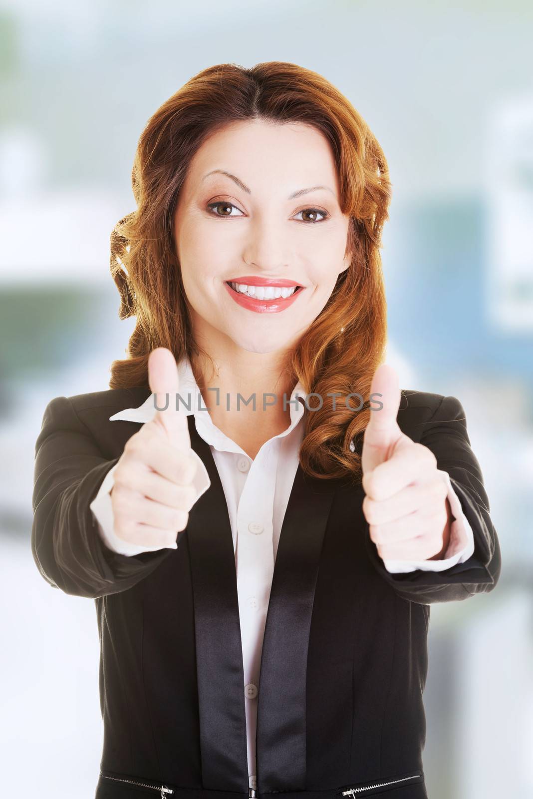 Business woman with thumbs up, ok gesture by BDS