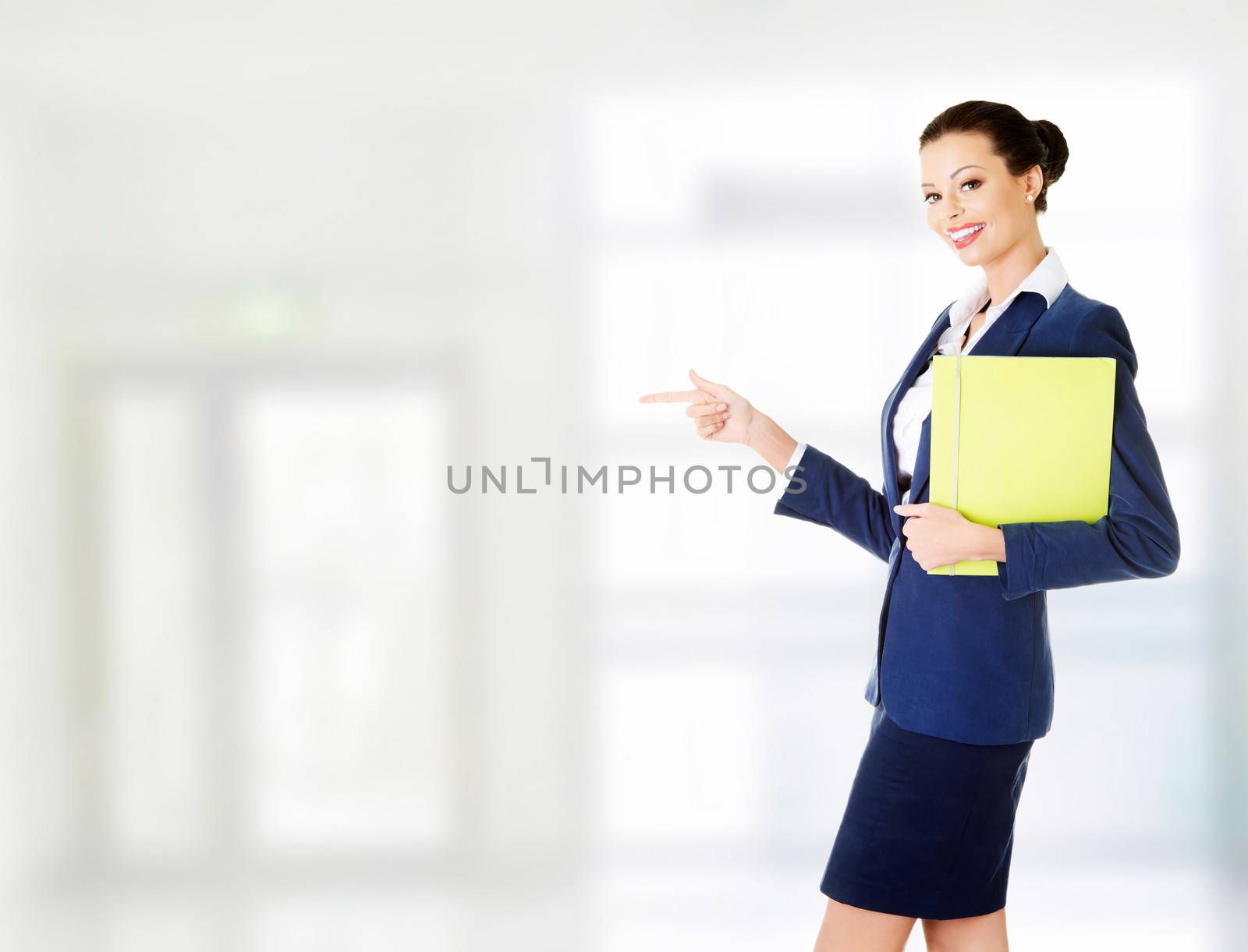 Portrait of young businesswoman isolated on white.
