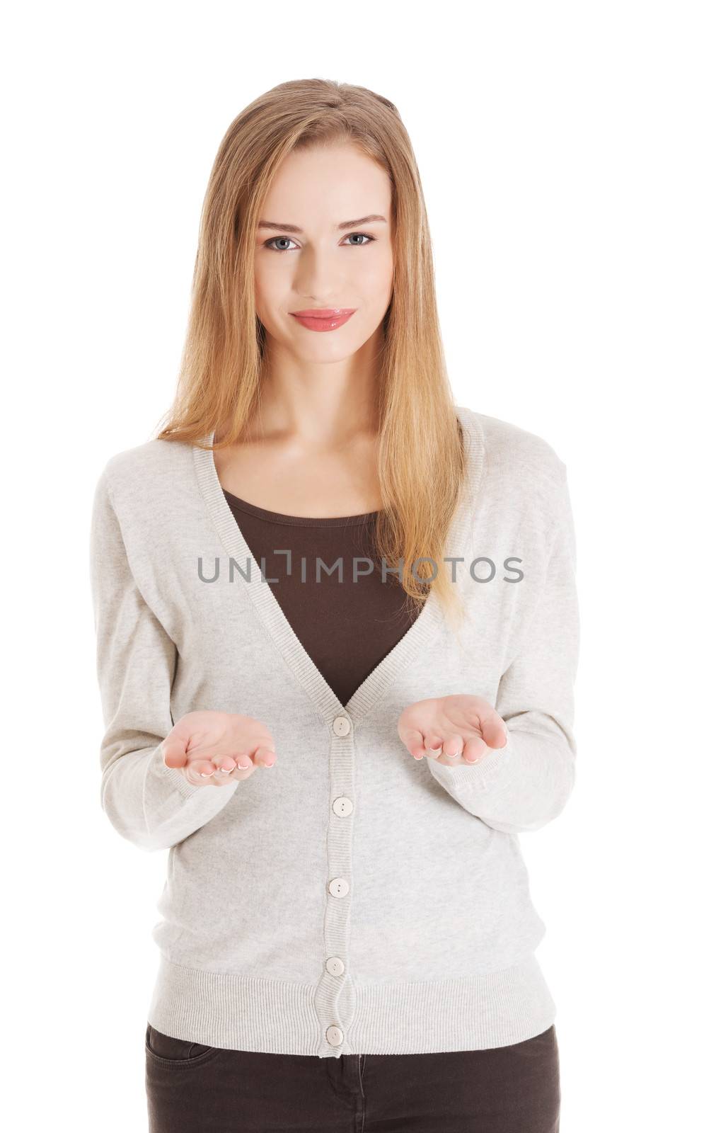 Beautiful casual woman is having a copy space on her palms, hands. Isolated on white.