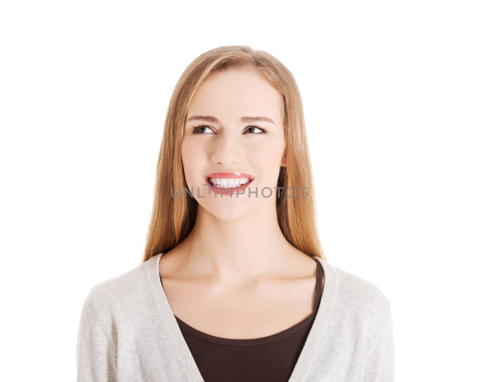 Portrait of beautiful smiling woman looking up. Isolated on white.