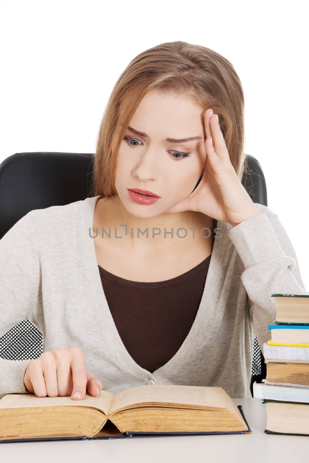 Beautiful casual woman student worried, scared is sitting by a d by BDS