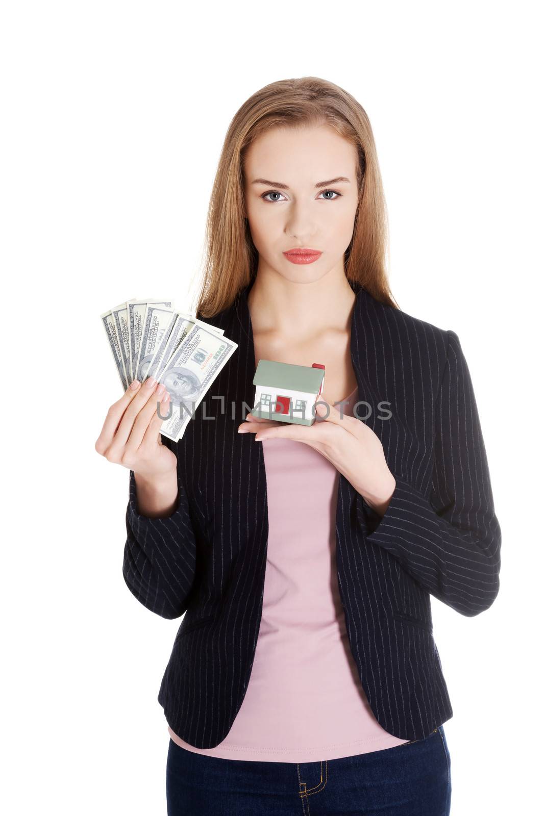 Beautiful business woman holding hpuse and dollars money. Isolated on white.