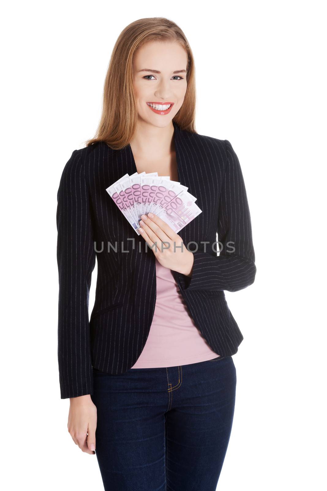 Beautiful business woman holdng euro currency money. Isolated on white.