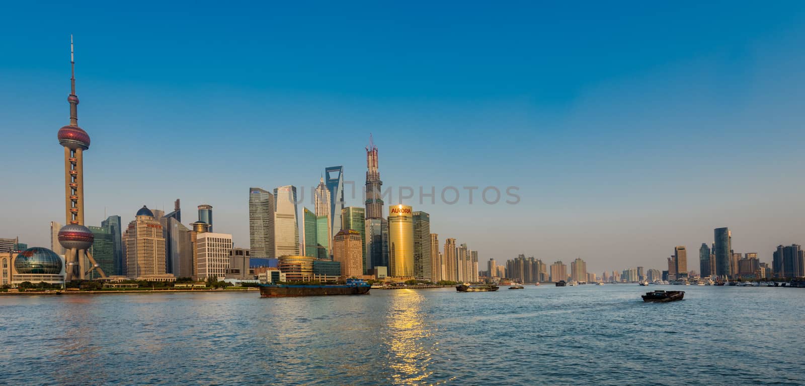 pudong and the bund on hangpu river shanghai china by PIXSTILL