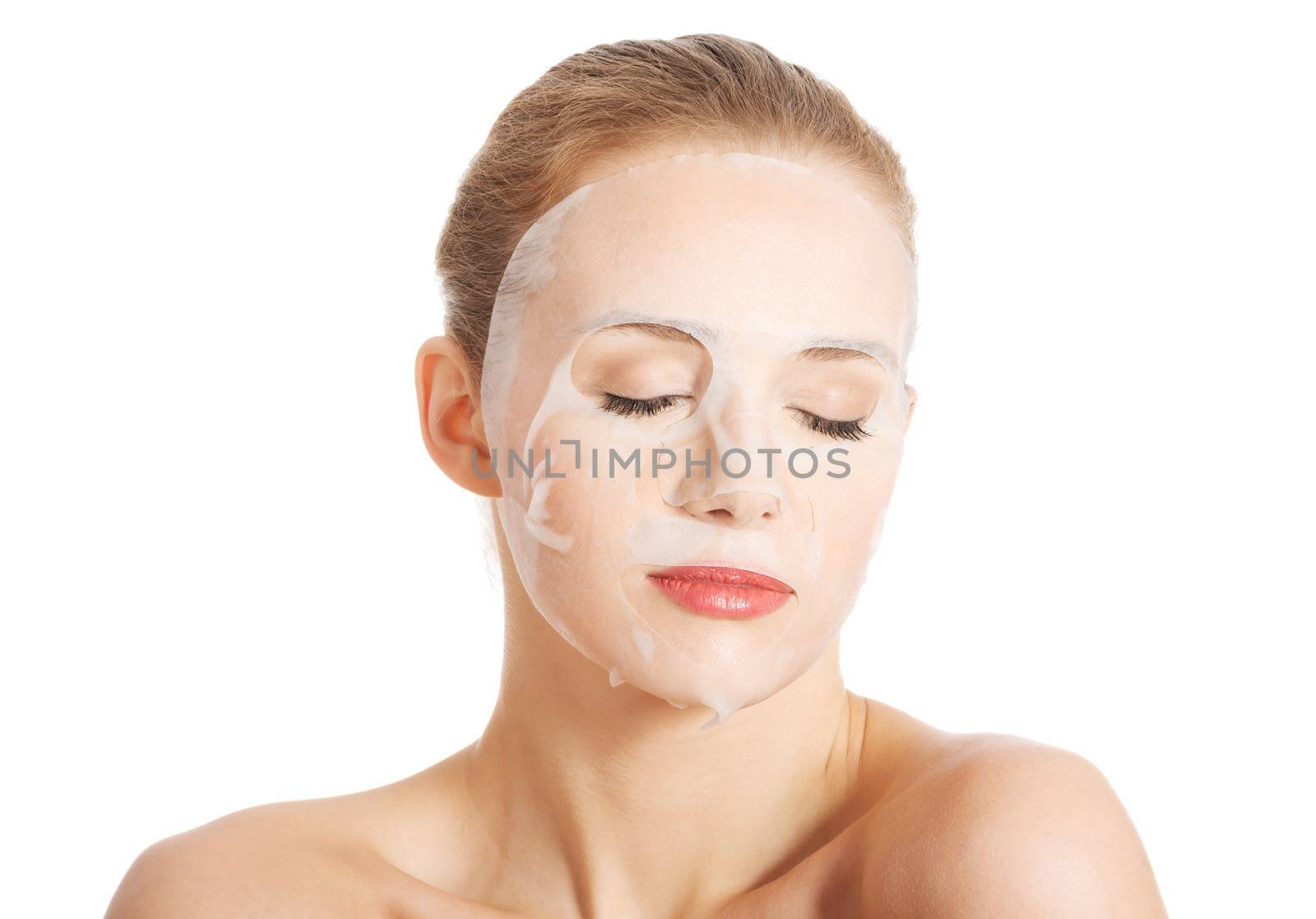 Beautiful woman with collagen mask on face. by BDS