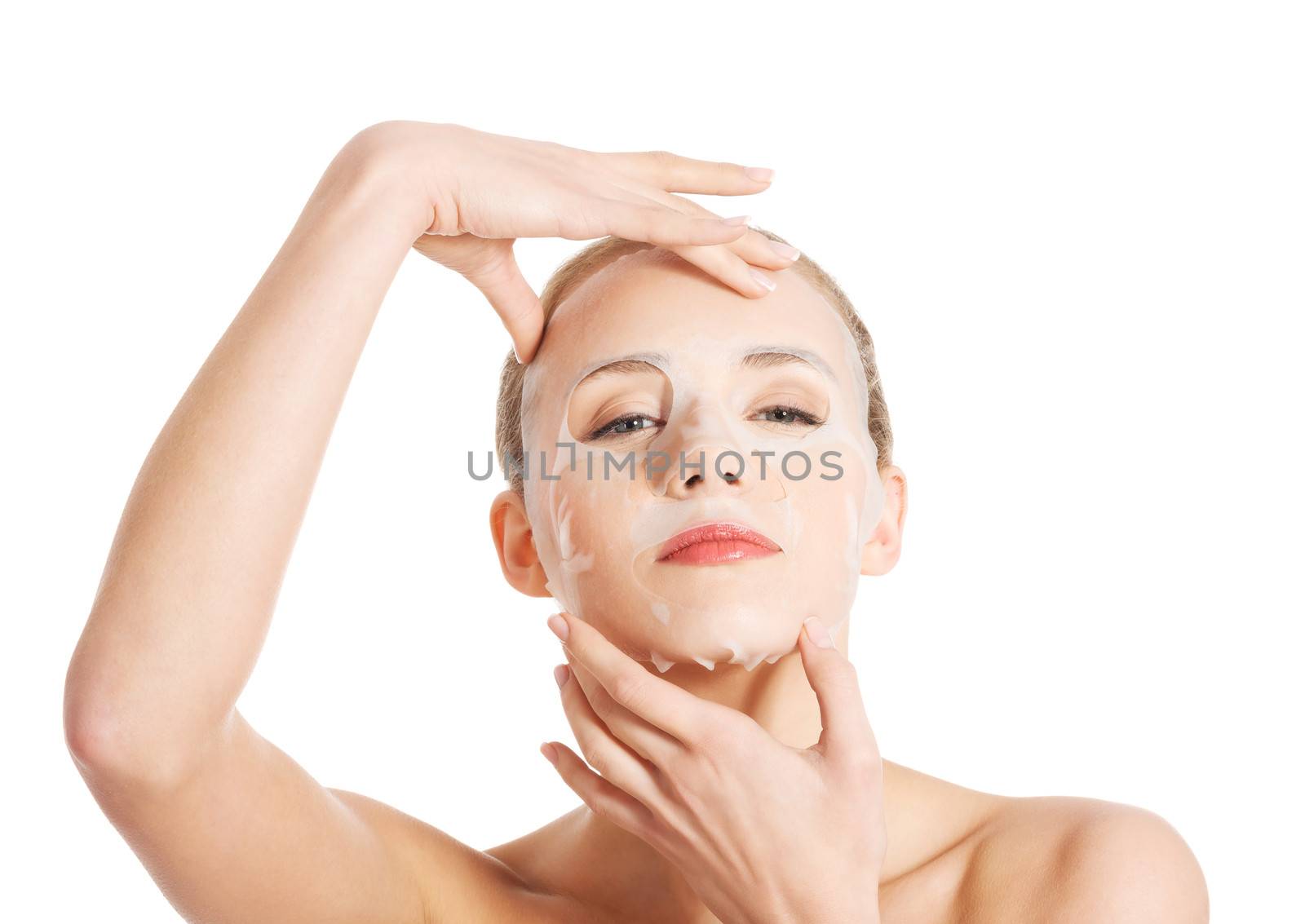 Beautiful woman with collagen mask on face. Isolated on white.