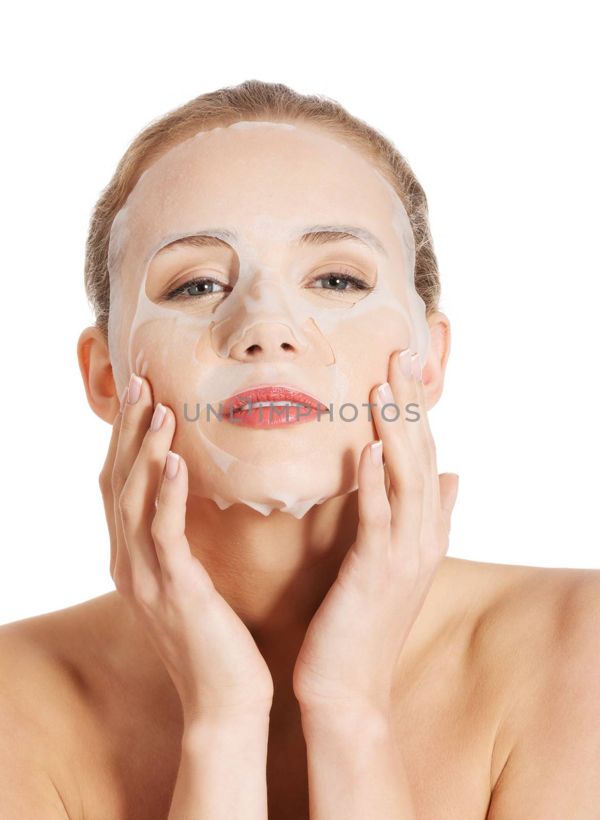 Beautiful woman with collagen mask on face. Isolated on white.