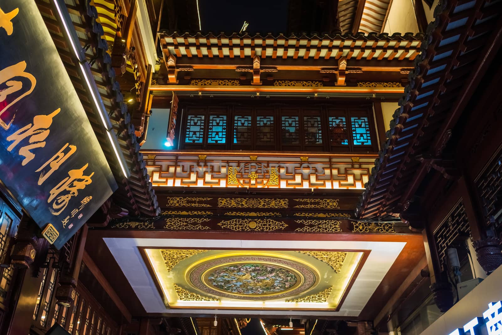 Shanghai, China - April 7, 2013: detail decorations of Fang Bang Zhong Lu old city at night in the city of Shanghai in China on april 7th, 2013