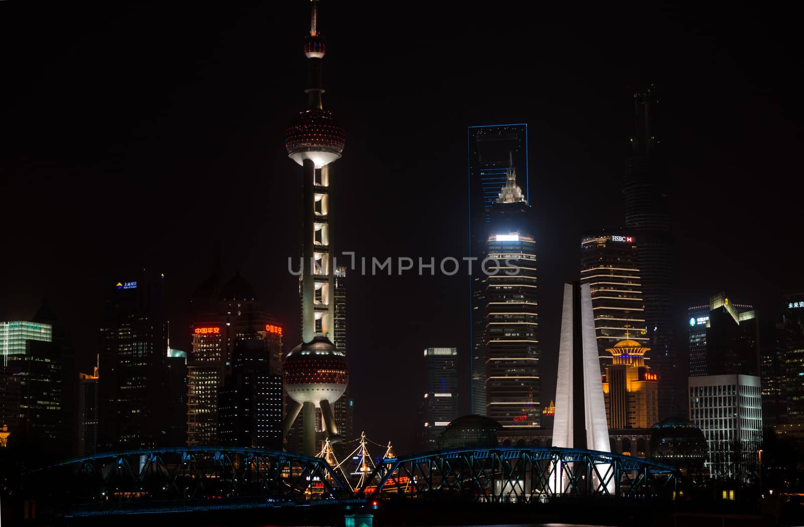 Shanghai, China - April 9, 2013: pudong waterfront at night at the city of Shanghai in China on april 9th, 2013