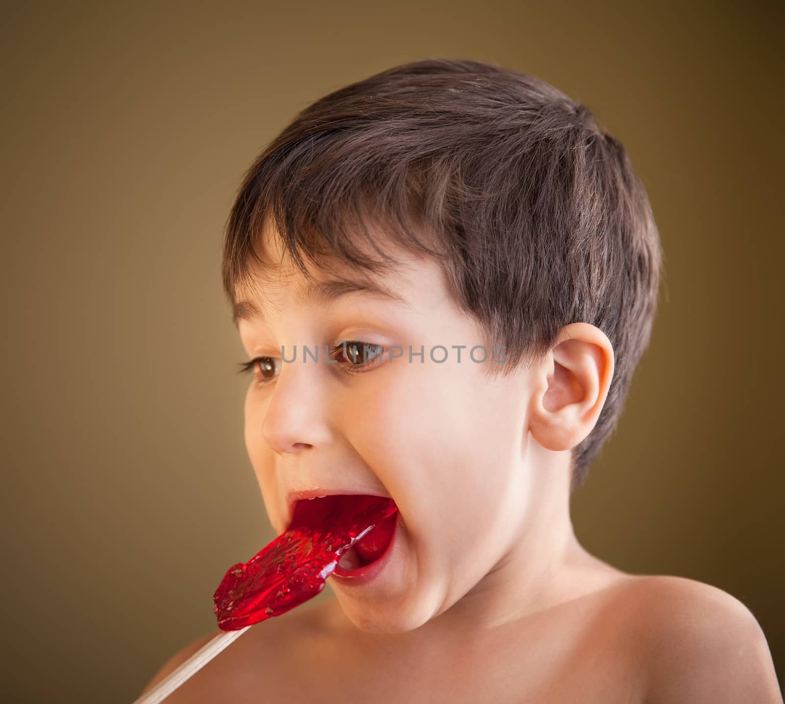 Boy Eating A Lollipop by palinchak
