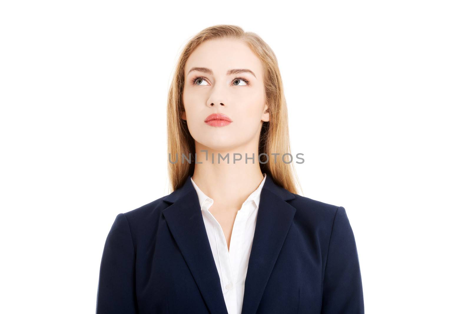 Beautiful business woman looking up at copy space. Isolated on white.