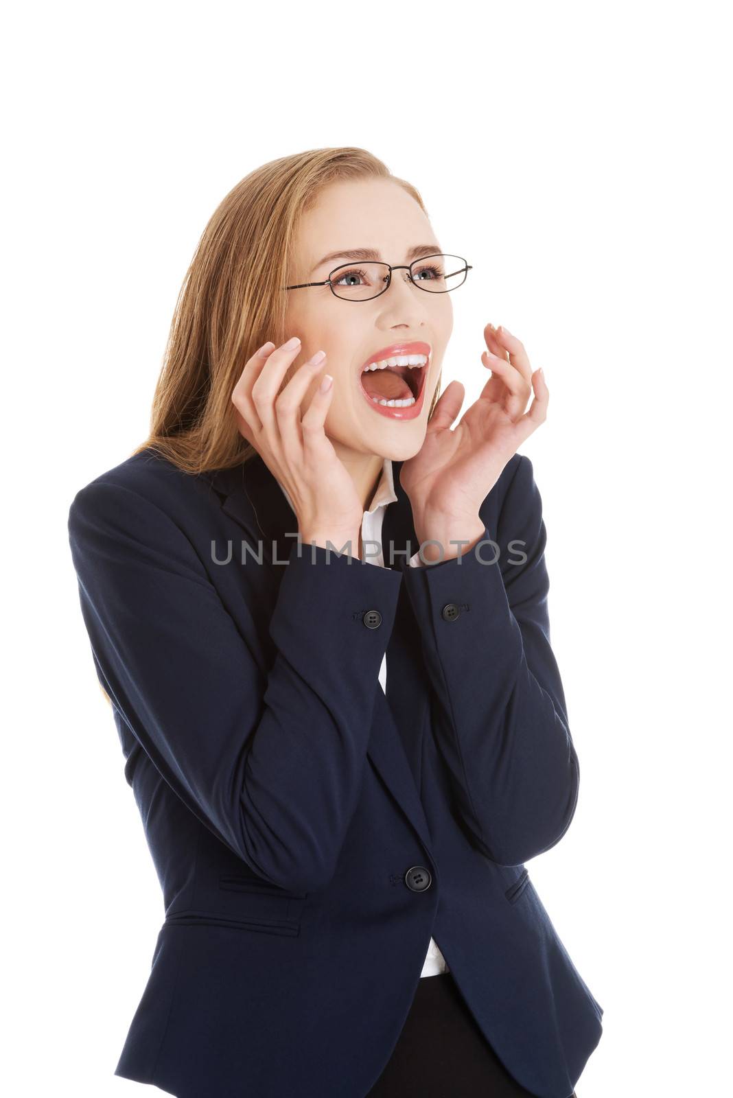 Shocked, surprised beautiful business woman. Isolated on white.