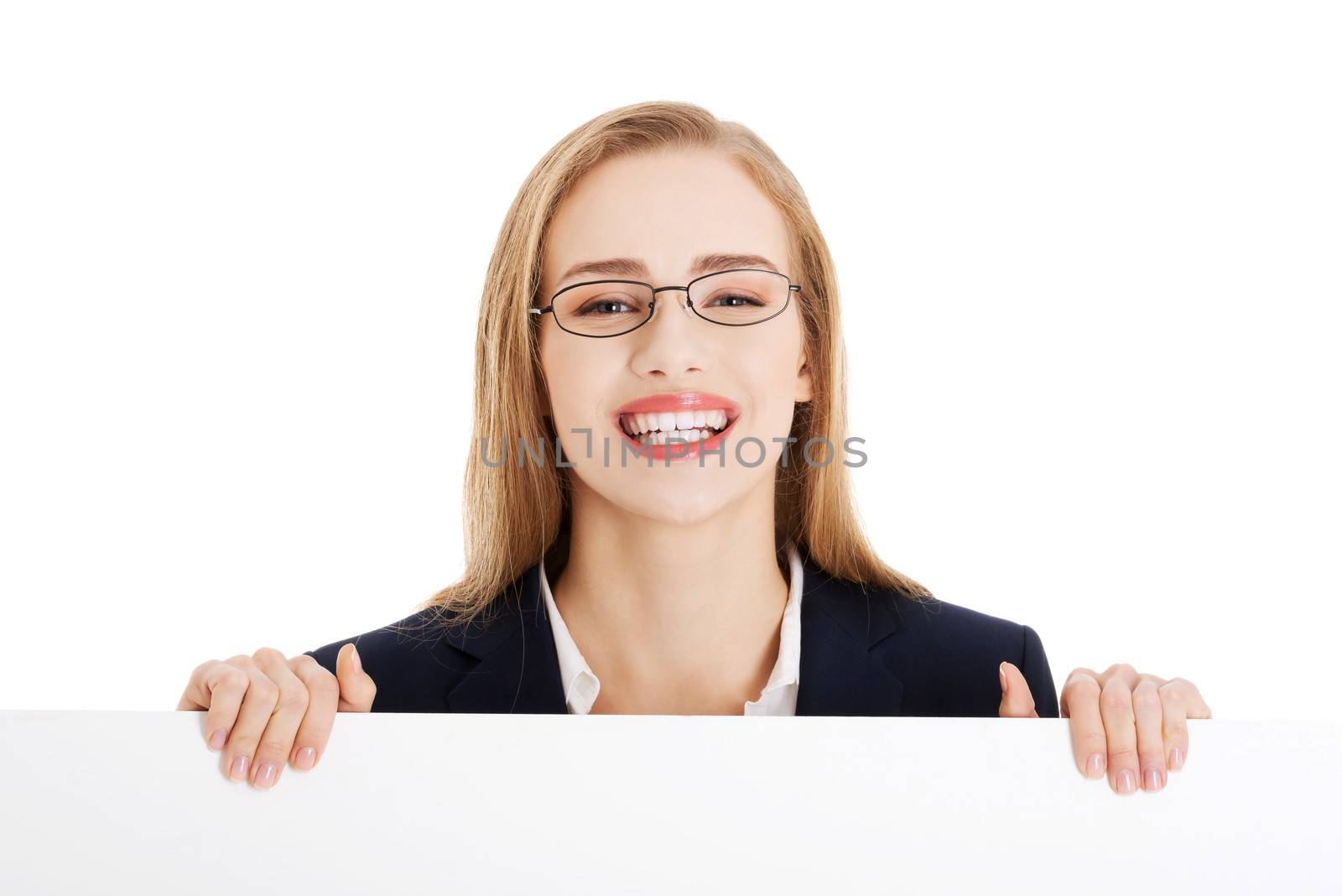 Beautiful business woman holding empty board, copy space. Isolated on white.