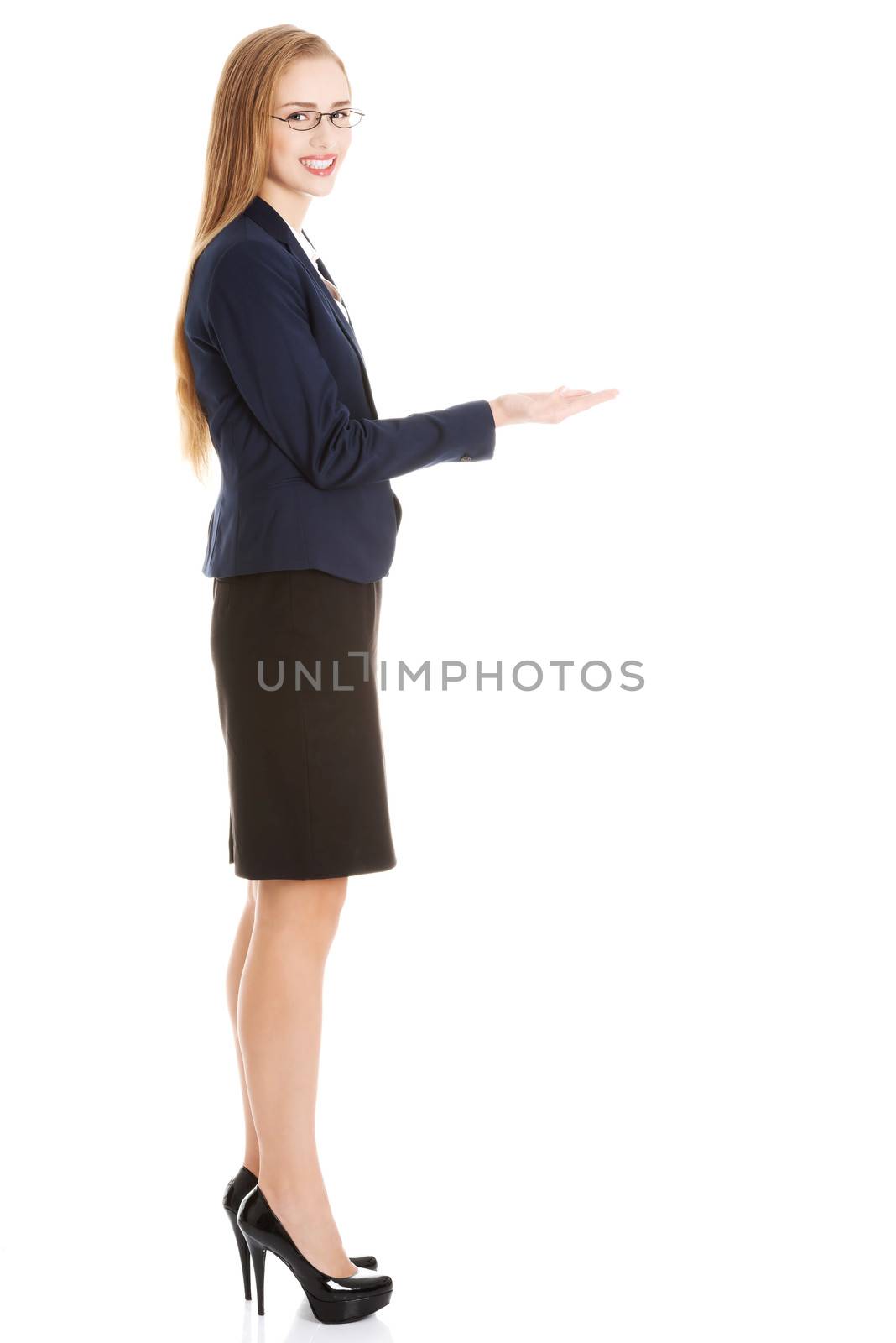 Beautiful business woman with copy space on her hand. by BDS