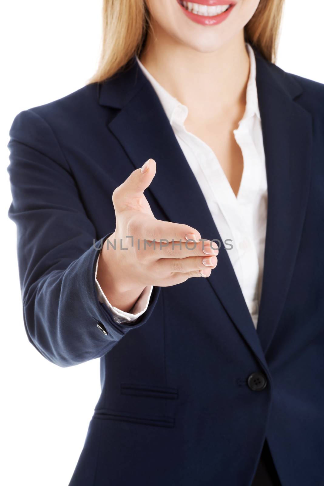 Beautiful business woman giving hand. Close up, over white background.