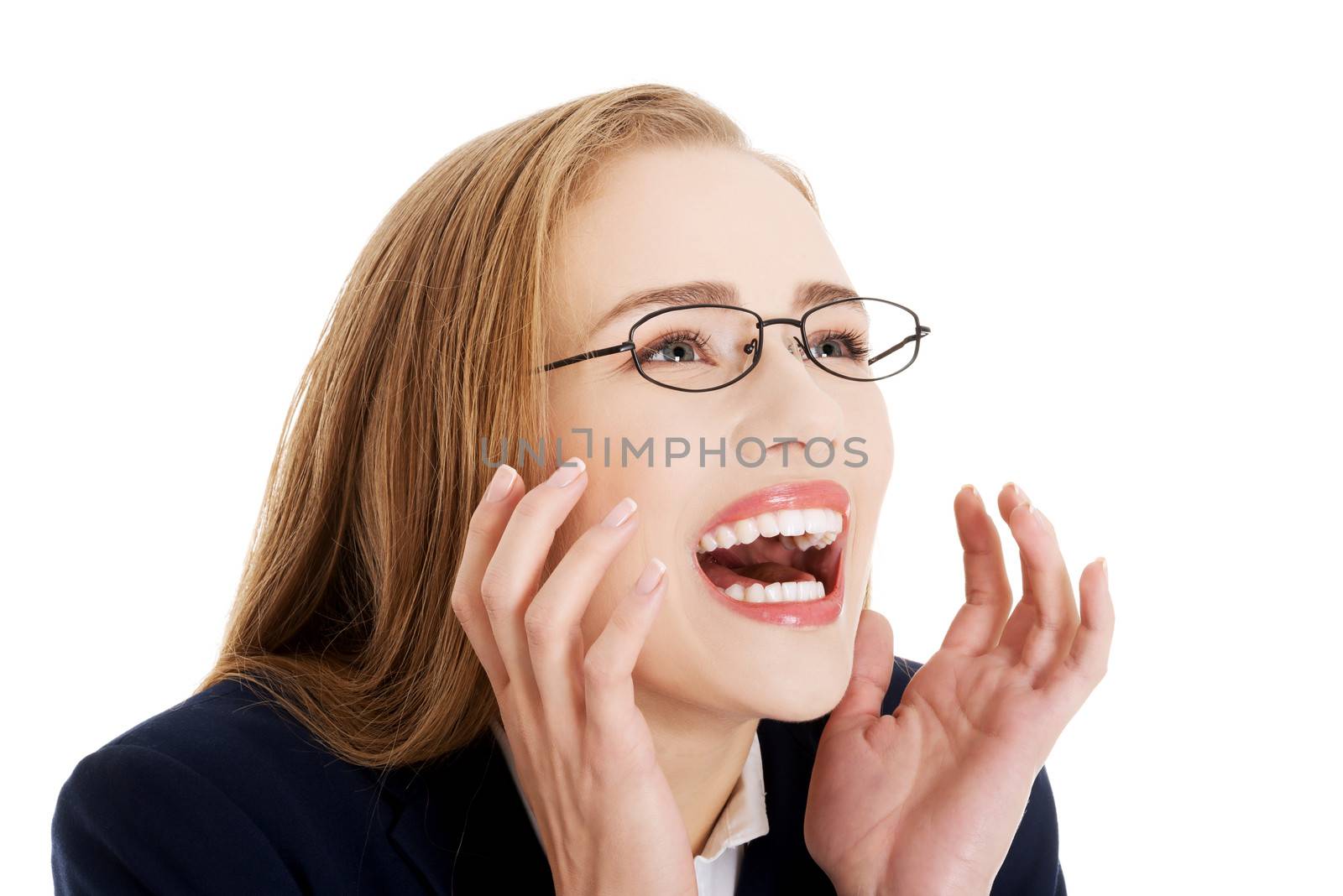 Shocked, surprised beautiful business woman. Isolated on white.