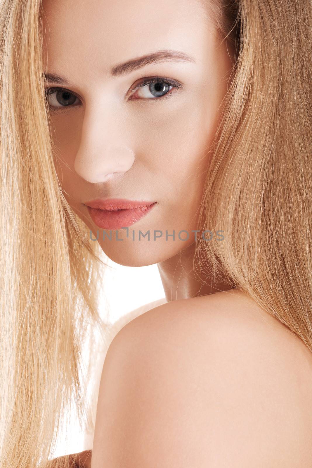 Portrait of beautiful caucasian bare woman. Head and shoulders. Over white background.