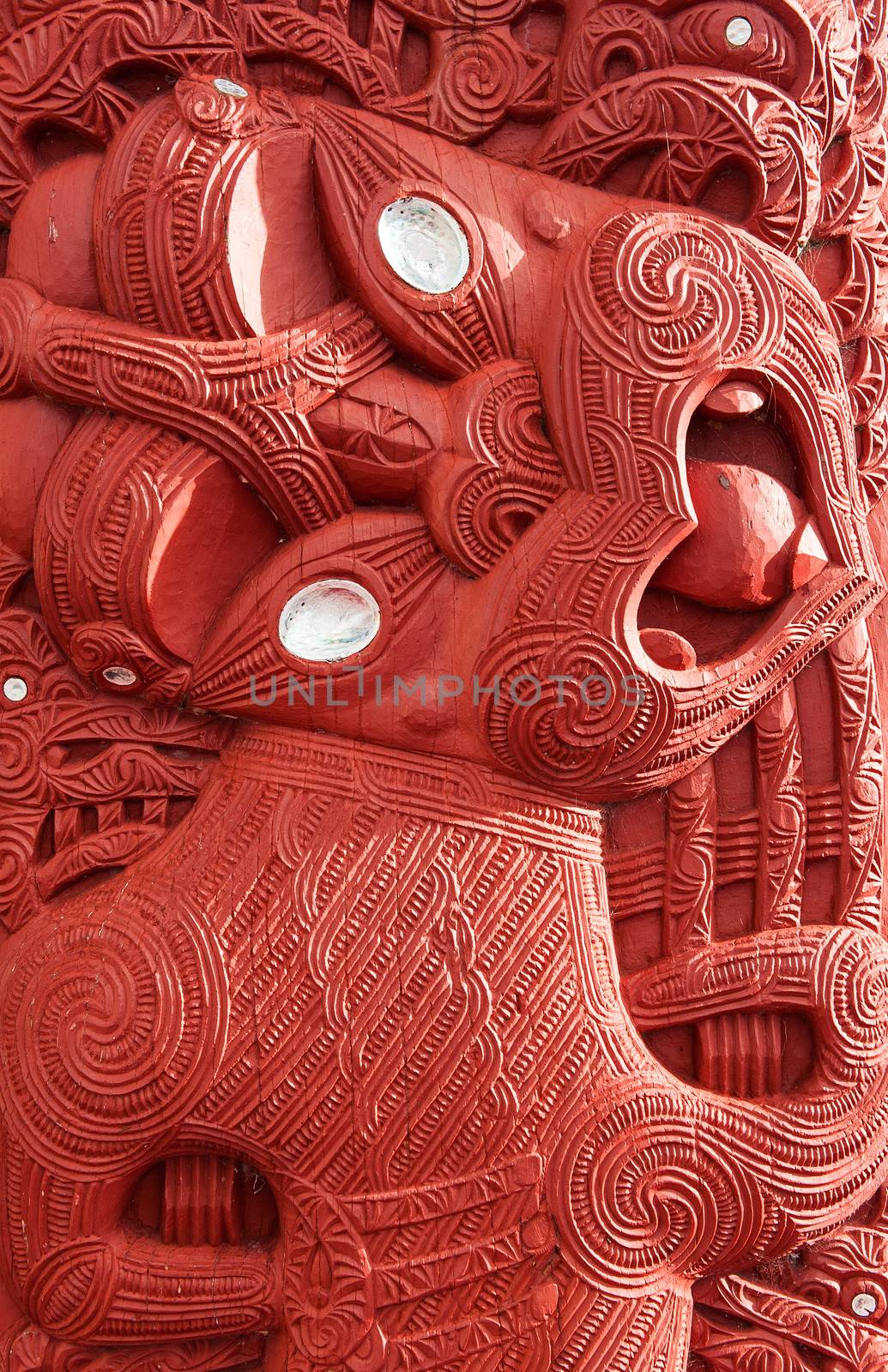  Beautiful maori carving. Detail of the historic meeting house Tamatekapua, Rotorua, New Zealand