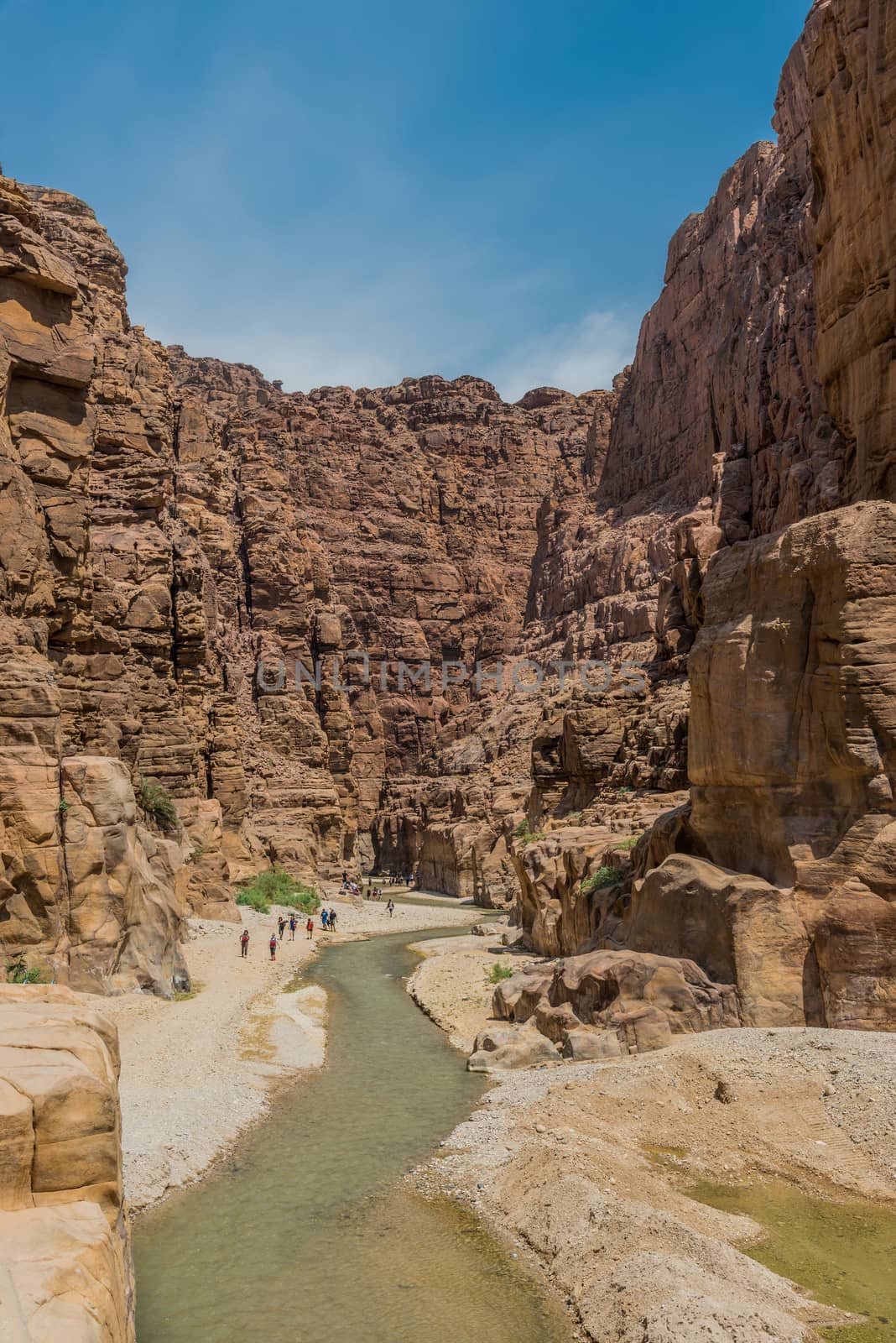 Wadi Mujib, Jordan - May 9, 2013: people waking in the canyon wadi mujib in Jordan middle east on may 9, 2013