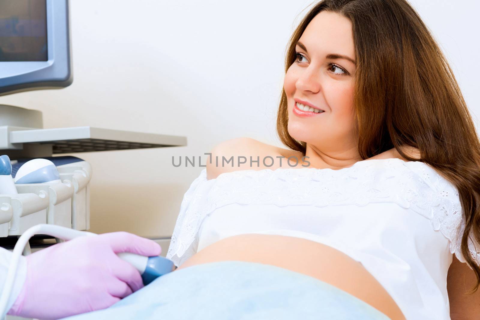 pregnant woman on reception at the doctor by adam121