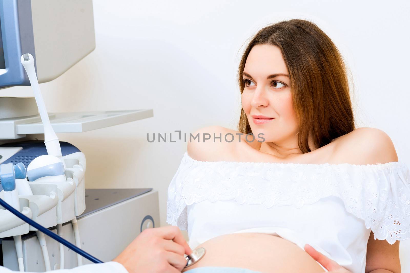 pregnant woman on reception at the doctor by adam121