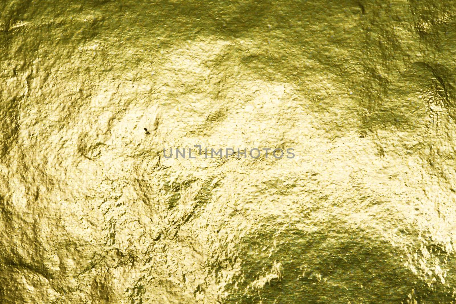 Shiny yellow gold foil abstract texture background