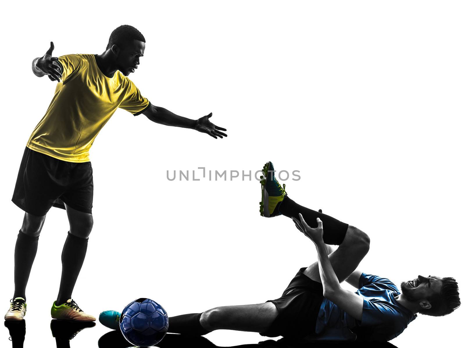 two men soccer player playing football competition complaining foul in silhouette on white background