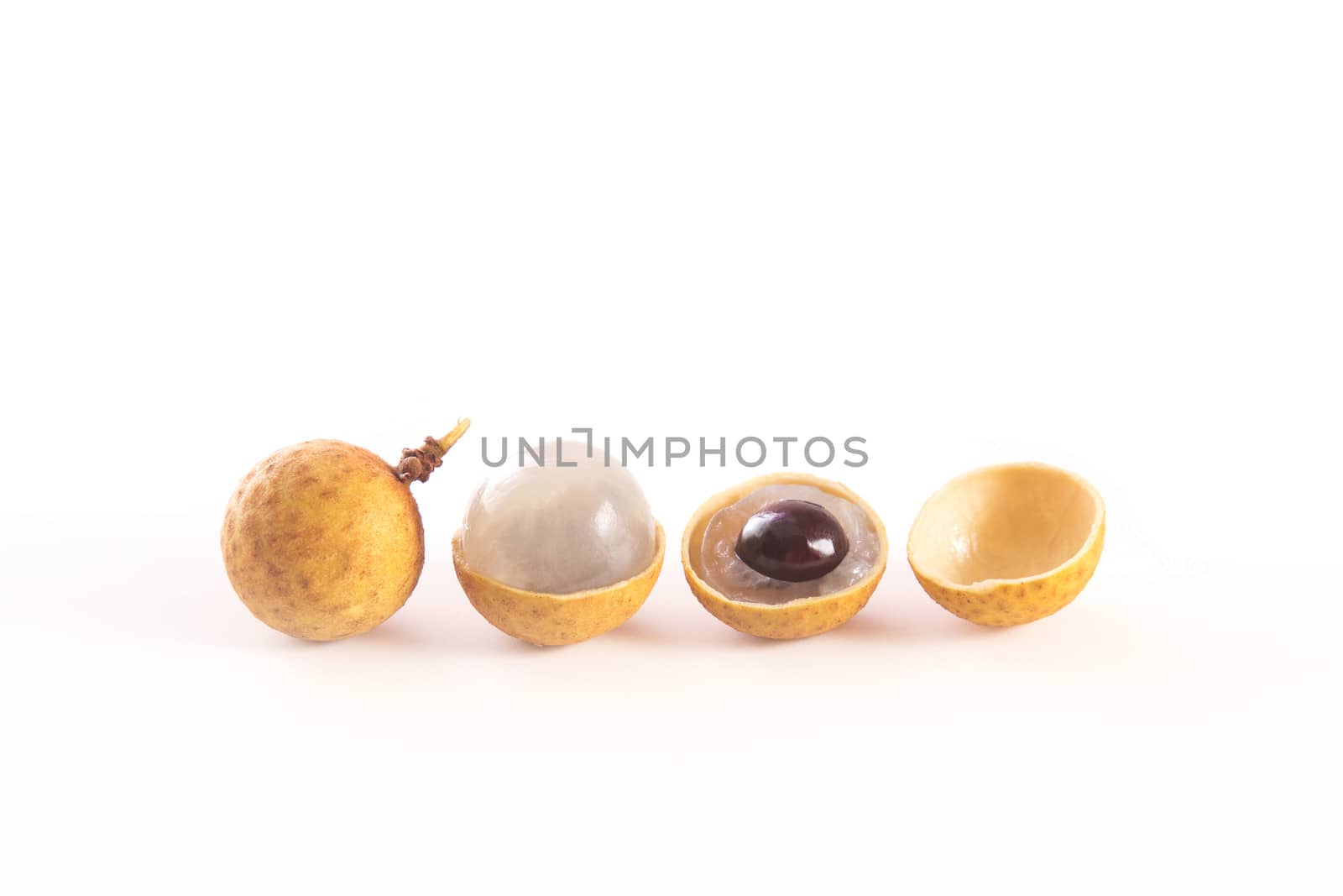 Fresh longan fruits, or dragon eye fruits, studio shot isolated on white background 