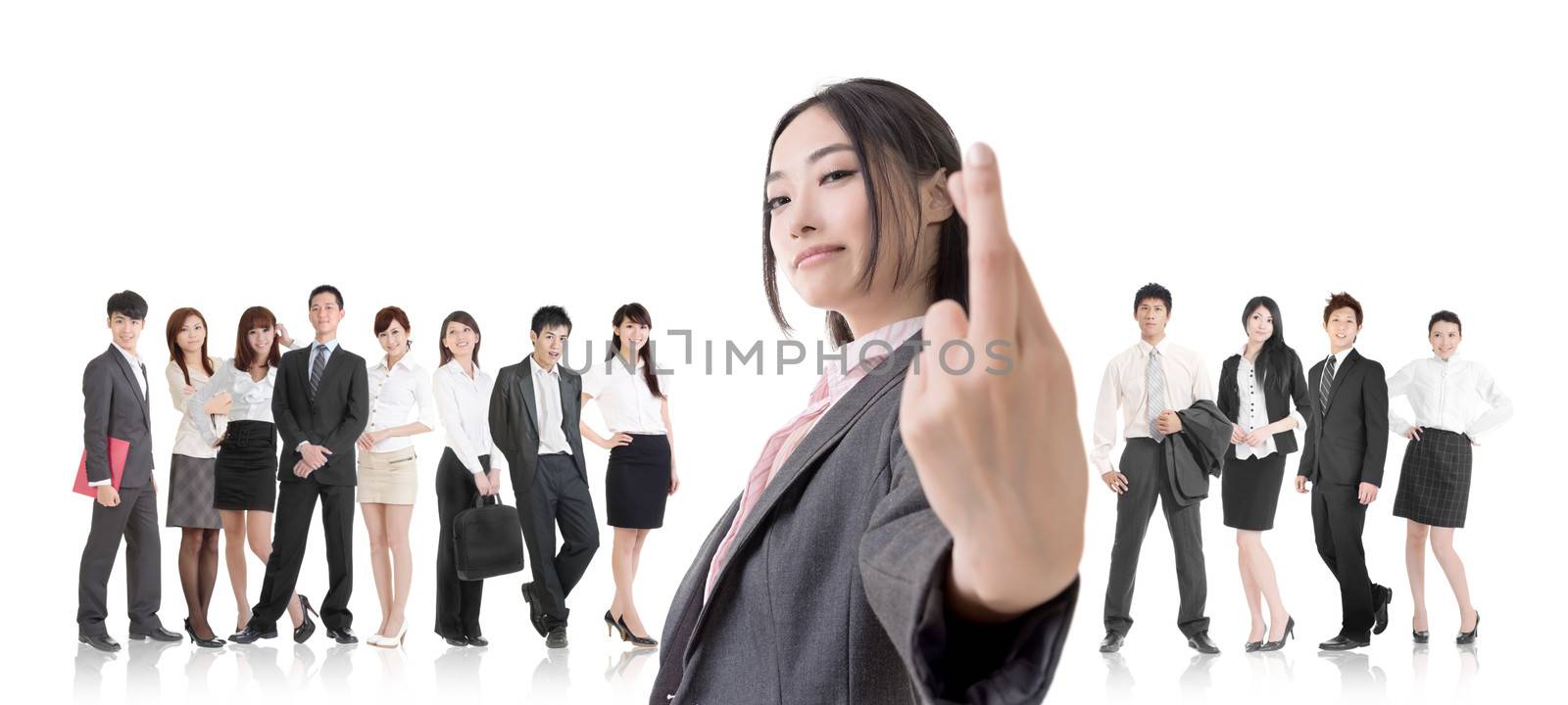 Attractive Asian business woman give you a fake sign and stand in front of her team.