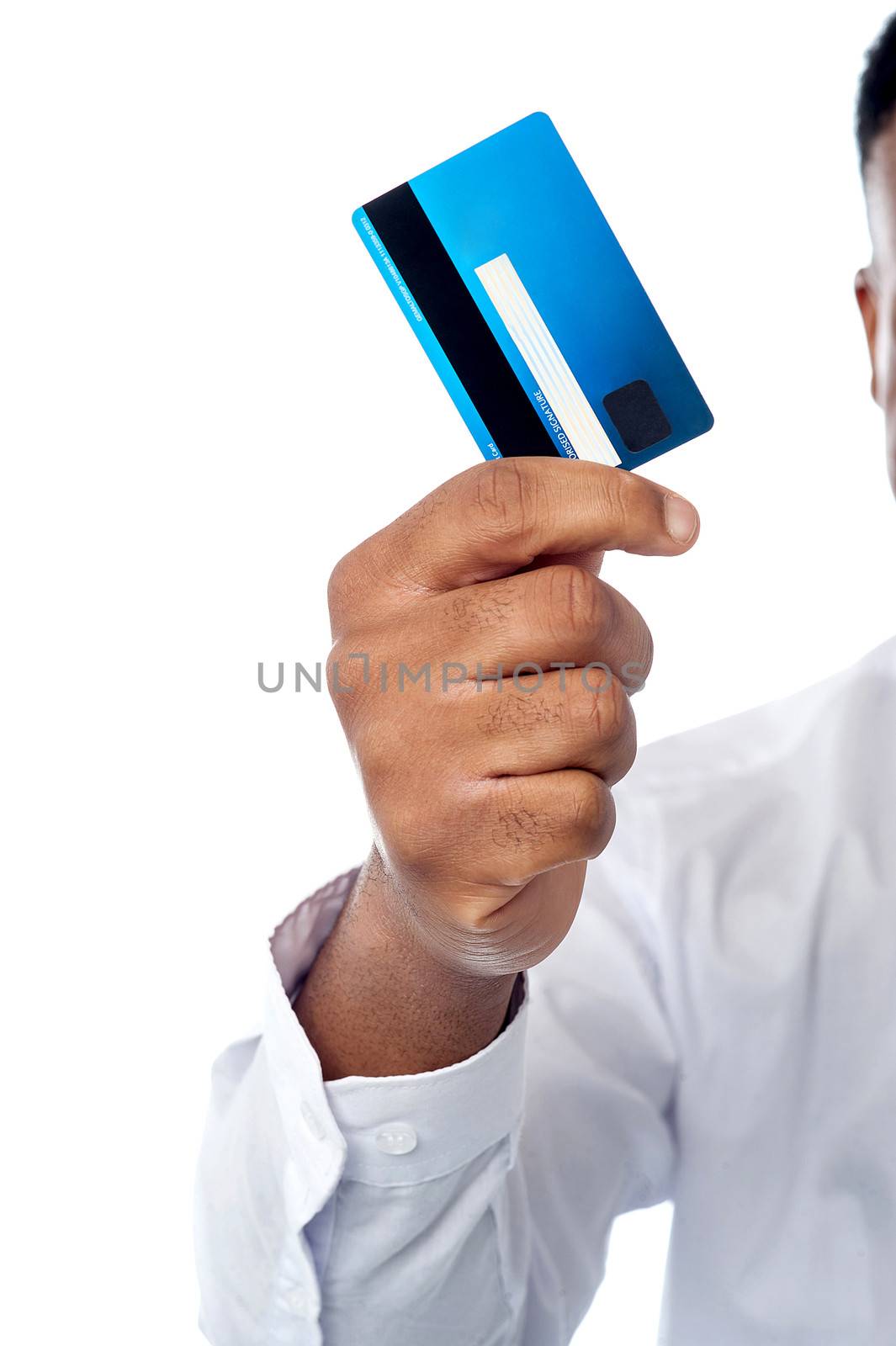 Cropped image of businessman displaying his credit card