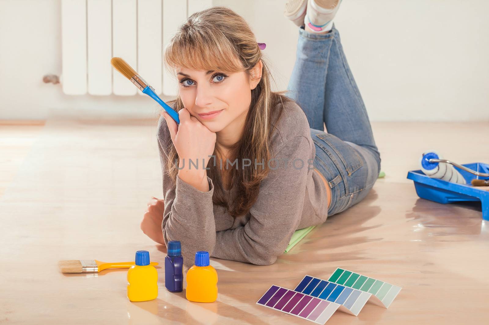 female paintier on floor