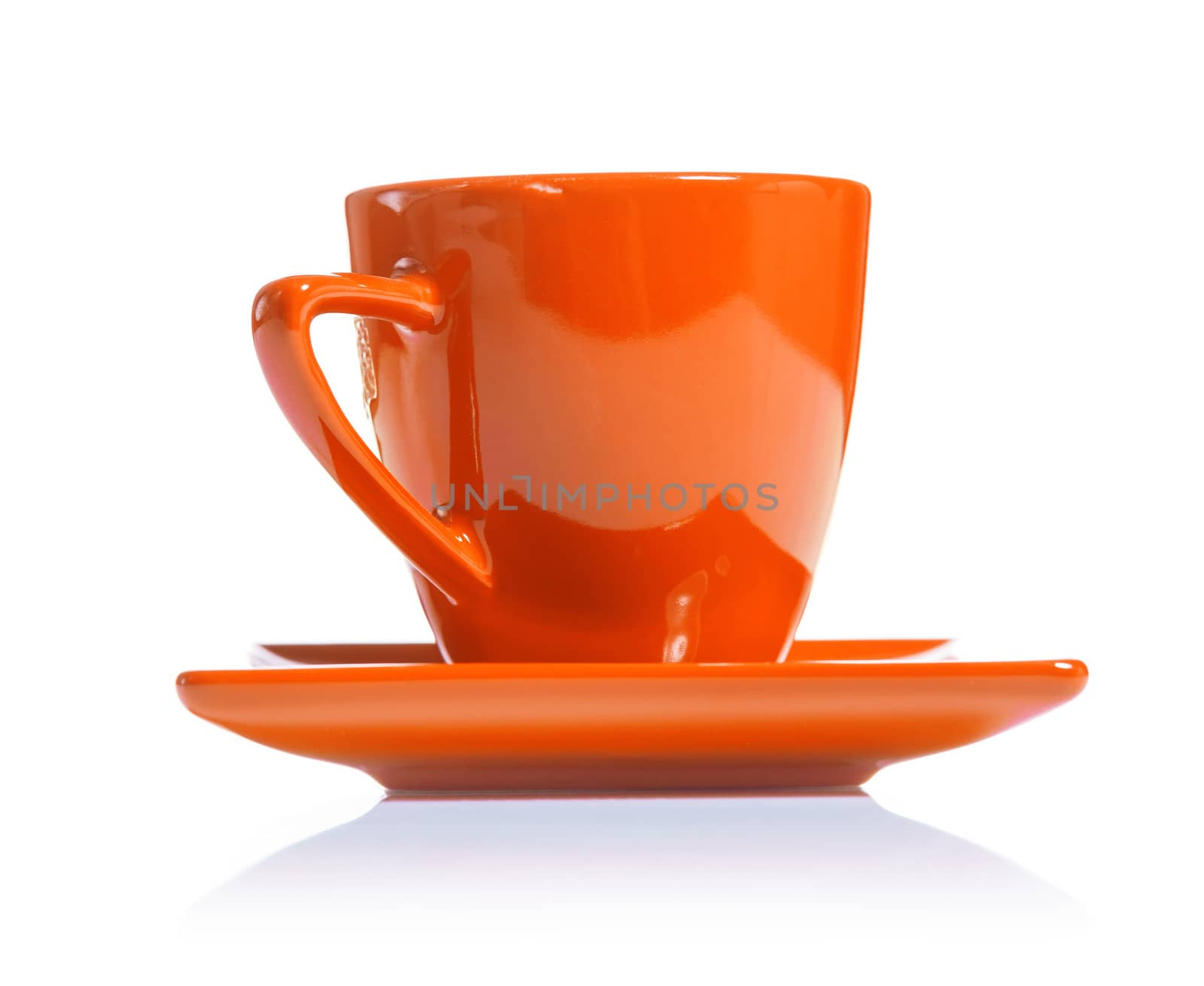 orange colored coffee cup isolated on white background