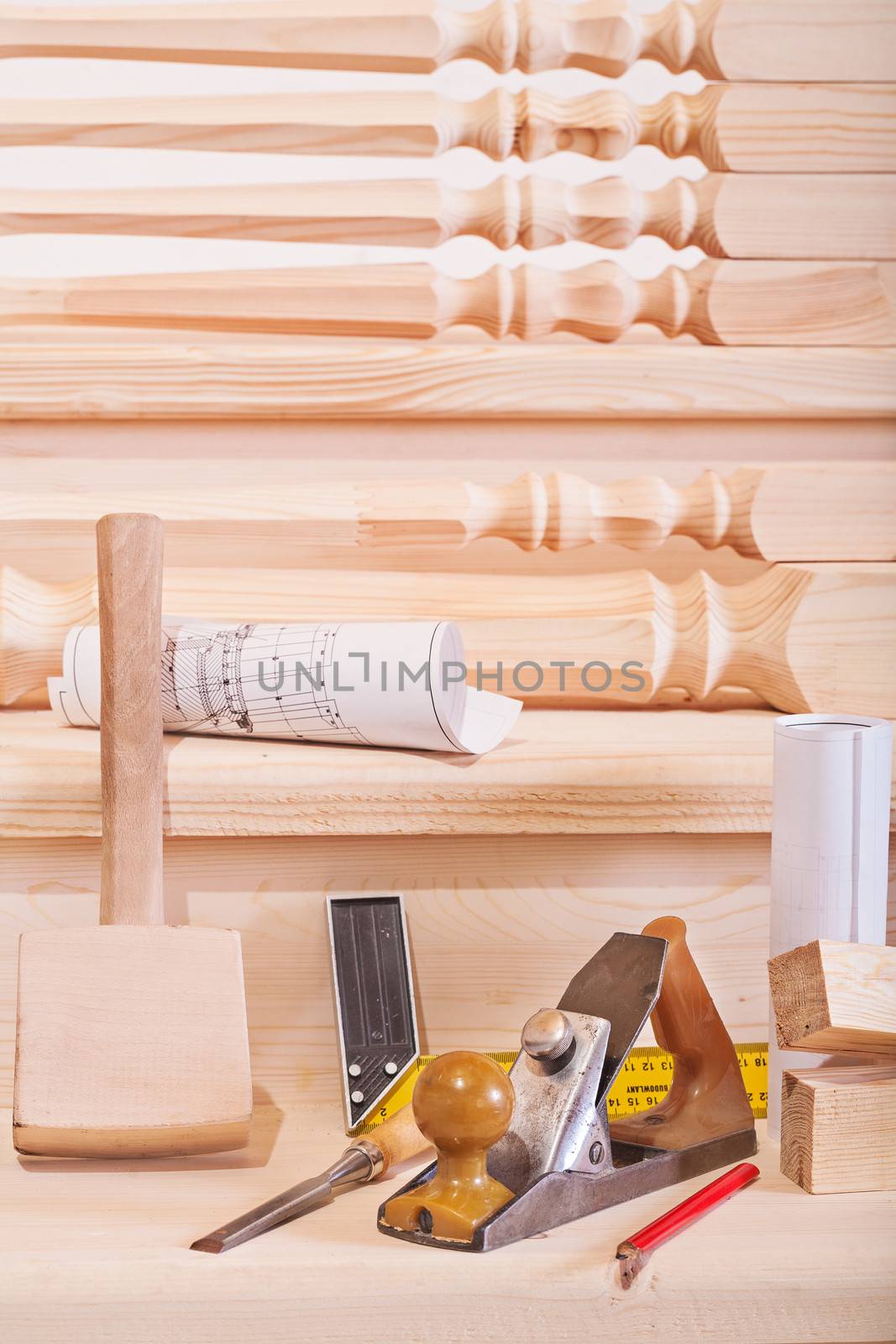 woodworking tools on steps of wooden lader