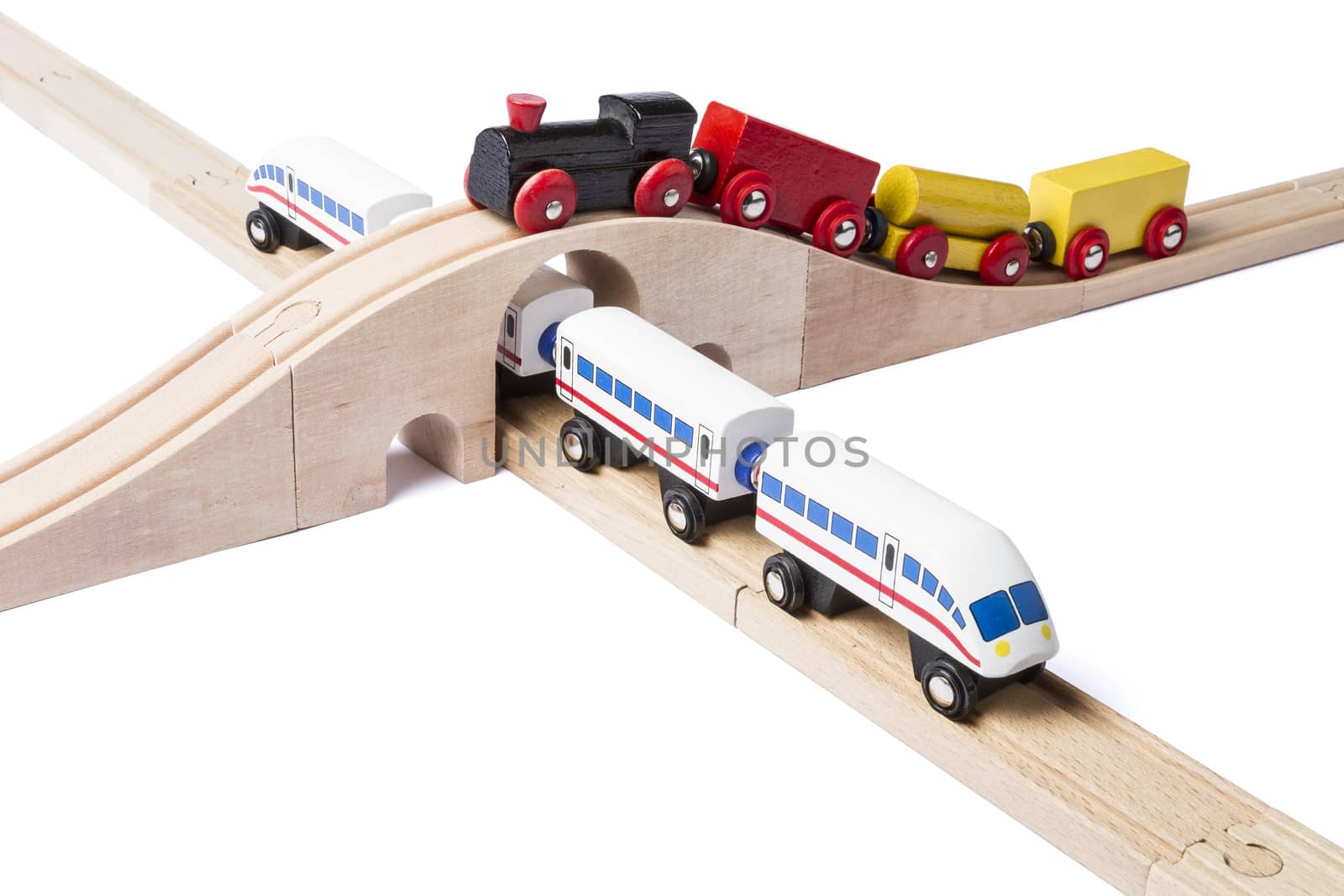 wooden toy trains on railway by gewoldi