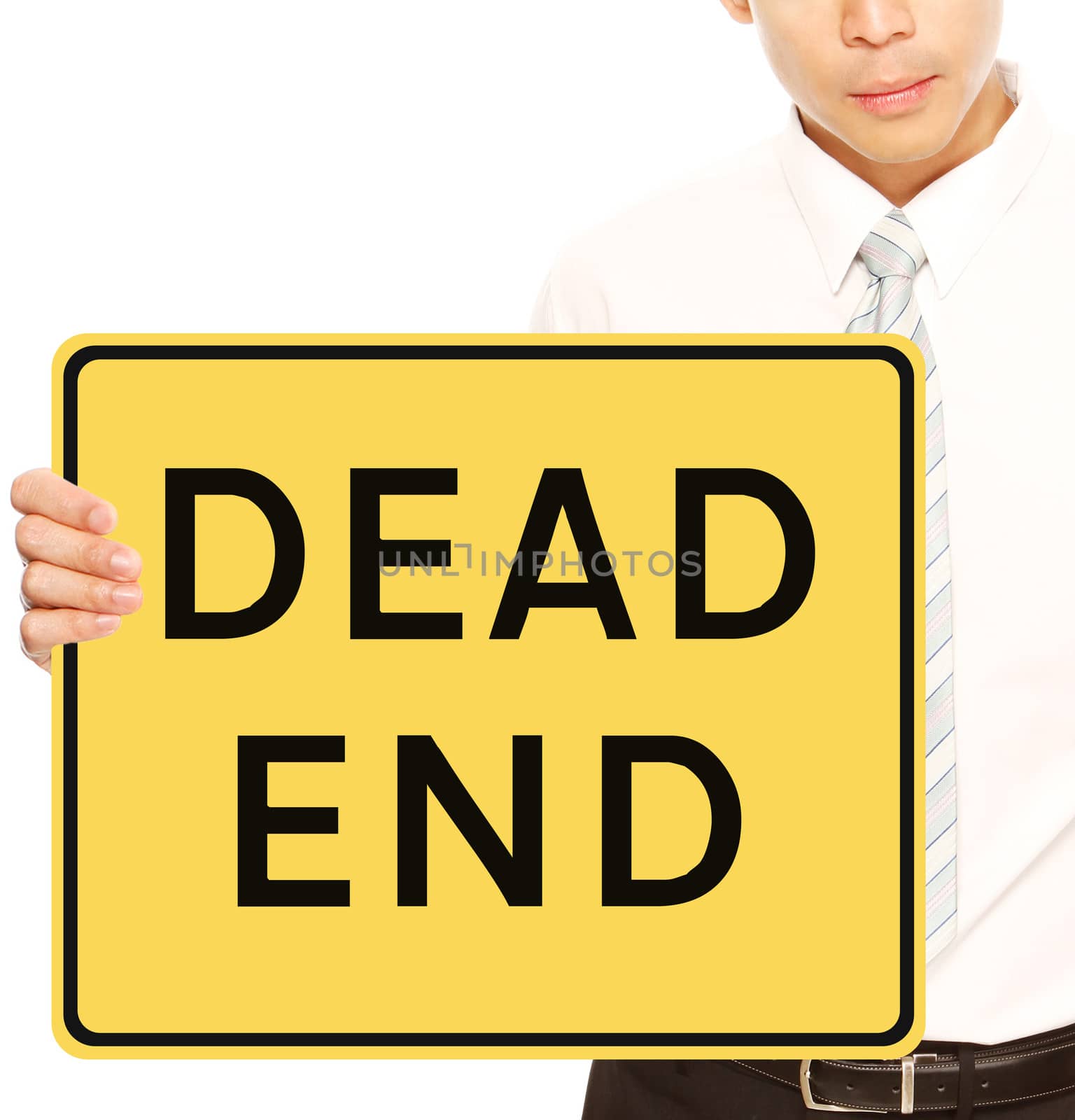 A businessman holding a sign indicating Dead End