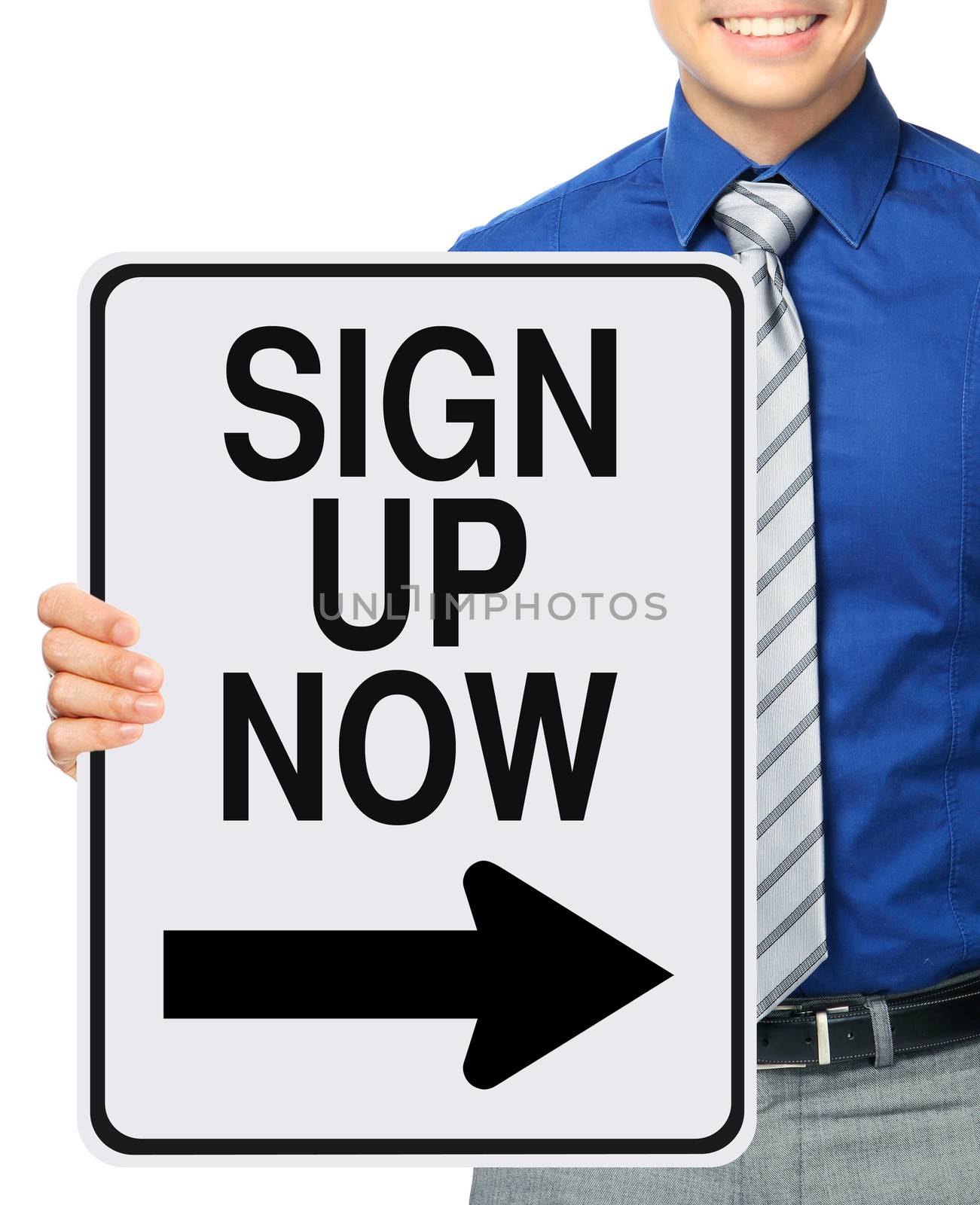 A businessman holding a sign indicating sign up now