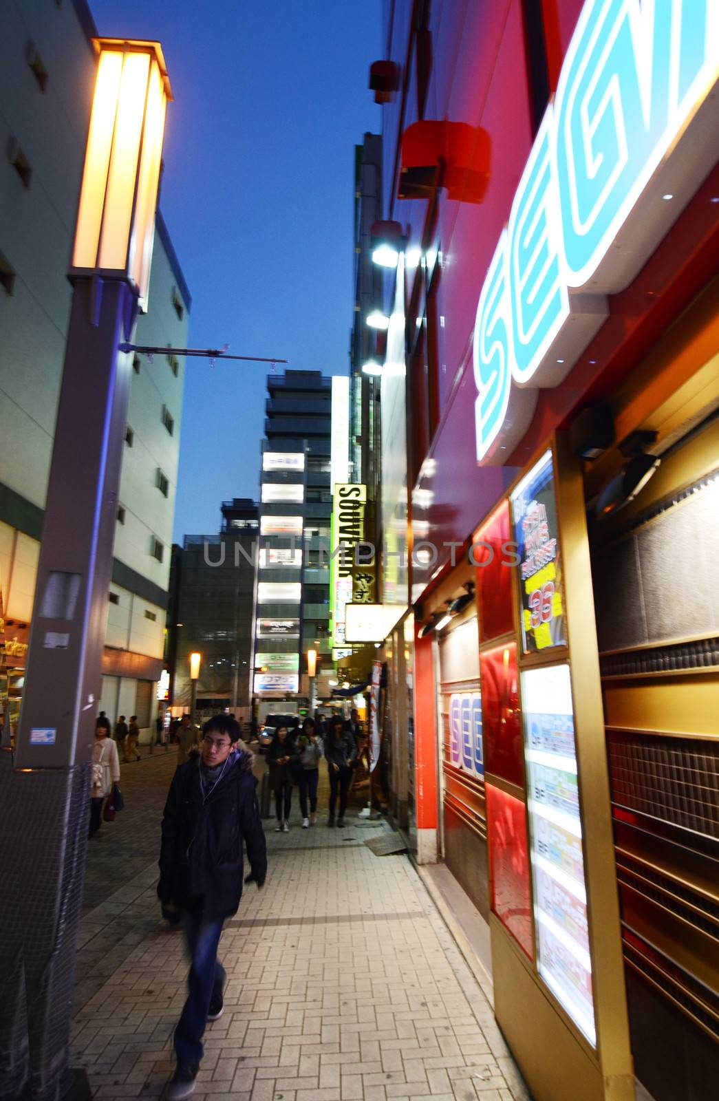 TOKYO - NOV 21: Akihabara district November 21, 2013 in Tokyo, Japan. The district is a major shopping area for electronic, computer, anime, games and otaku goods. 