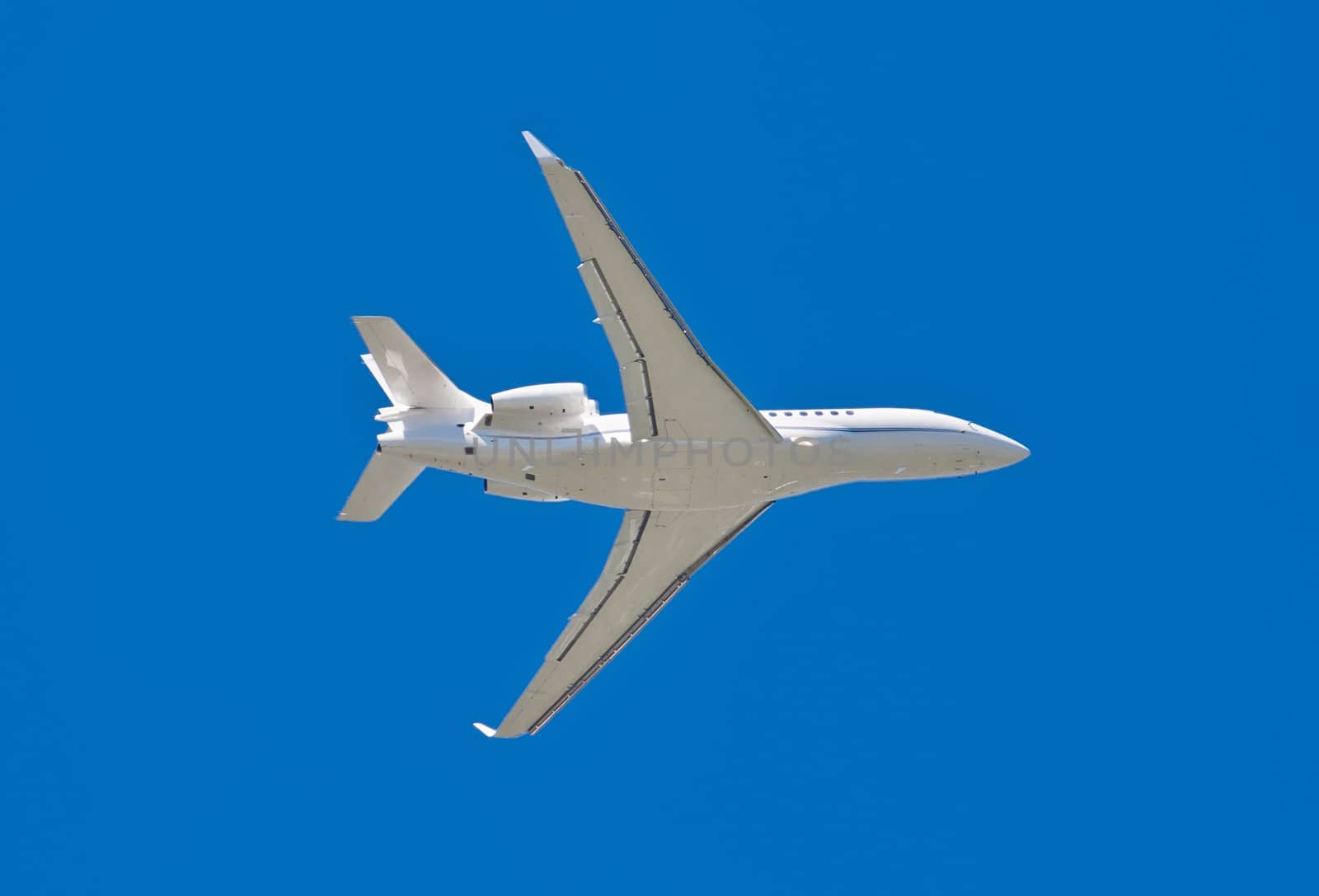 Beautiful white passenger airplane in blue sky