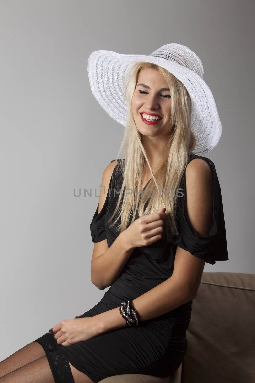 smiling woman with a hat
