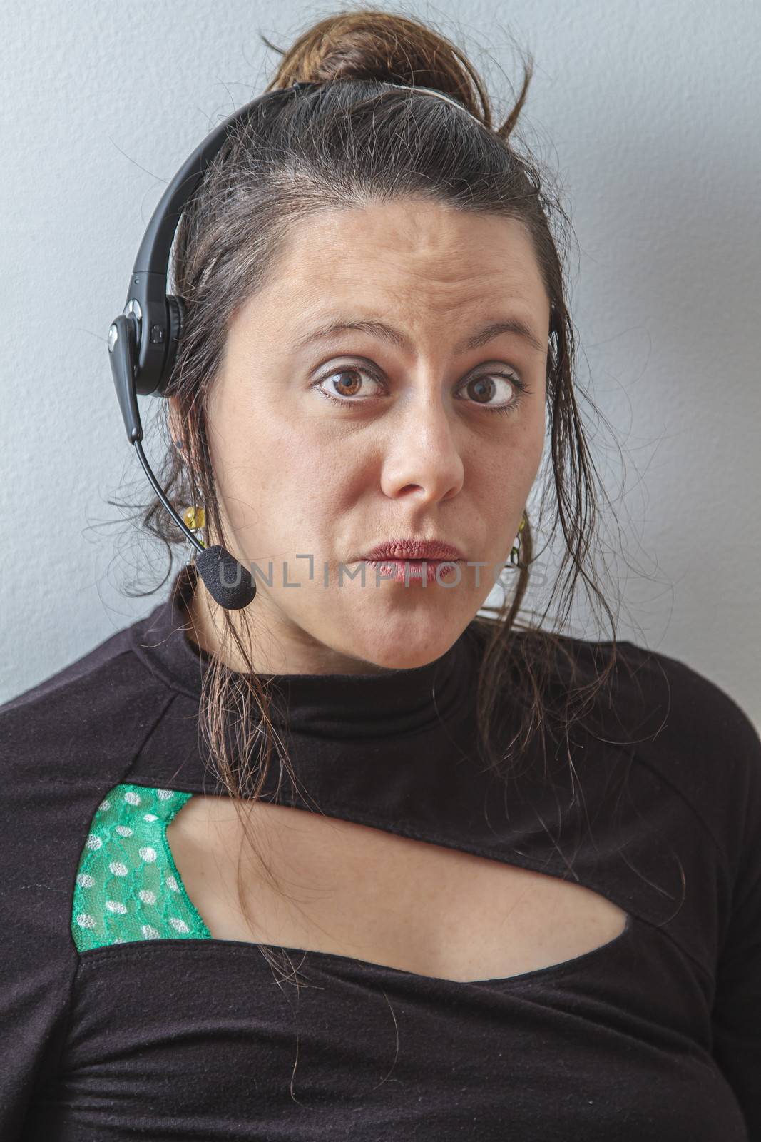 thirty something phone agent with headset with oh face