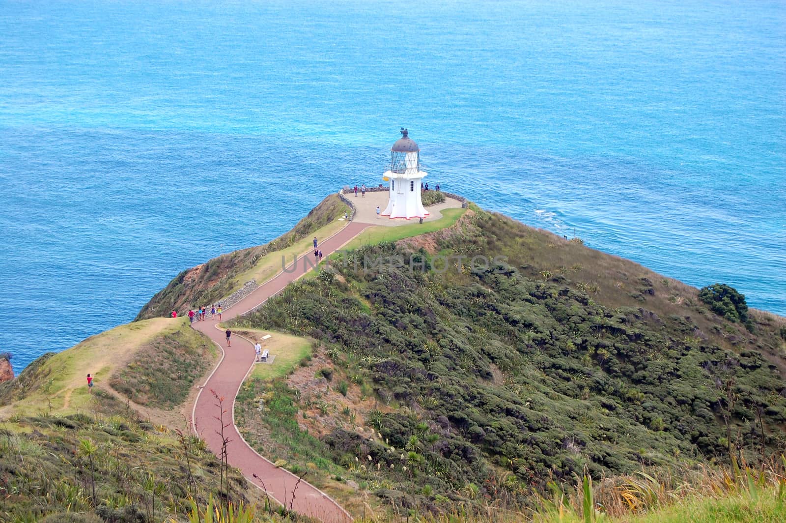 Old style white lighthouse at Cape Reinga, New Zealand