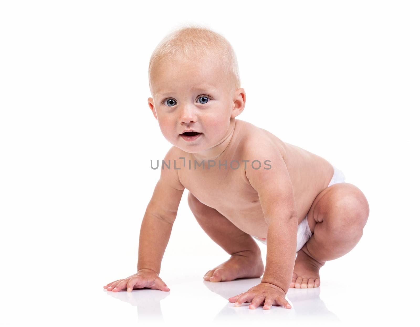 funny crawling baby boy over white background